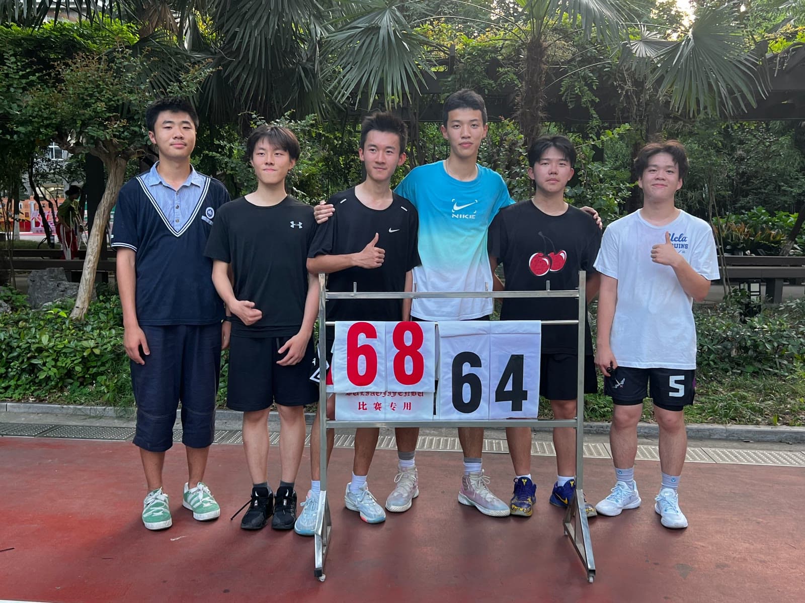 ZMBA group photograph beside the outdoor court, dated May 24, 2024.