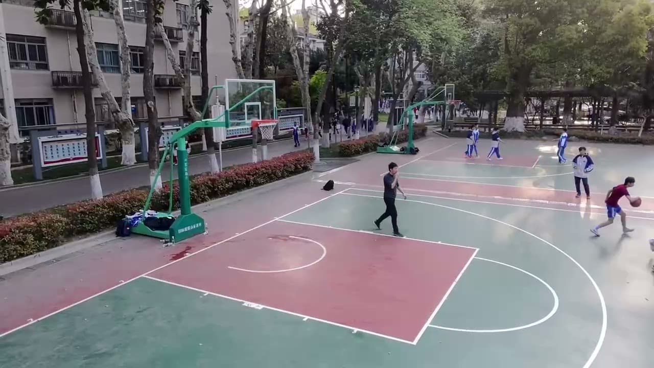 Video still of basketball activity on the outdoor courts, dated April 3, 2025.